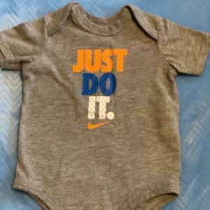 Gently used 0-3 month Nike onesie